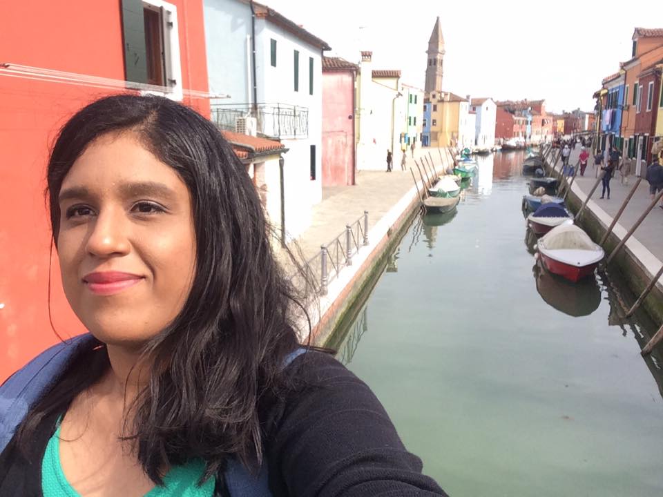 Me taking a selfie next to a canal in Burano, Italy 